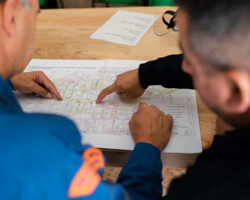 person writing on white paper
